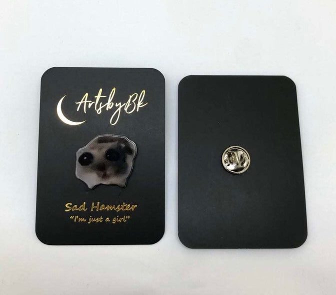 Sad hamster enamel pin
