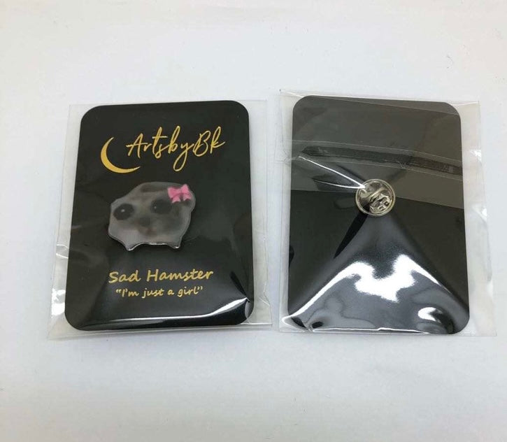 Sad hamster enamel pin