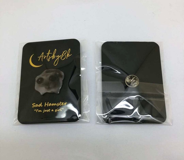 Sad hamster enamel pin